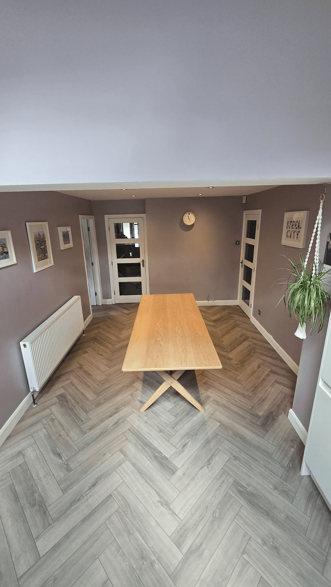 Renovated room with herringbone floor